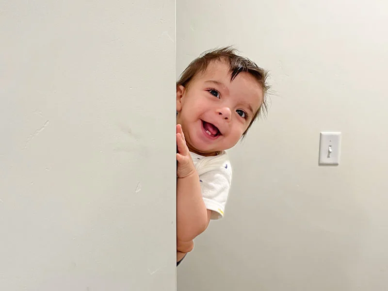 Baby Cyrus playing Peek a Boo