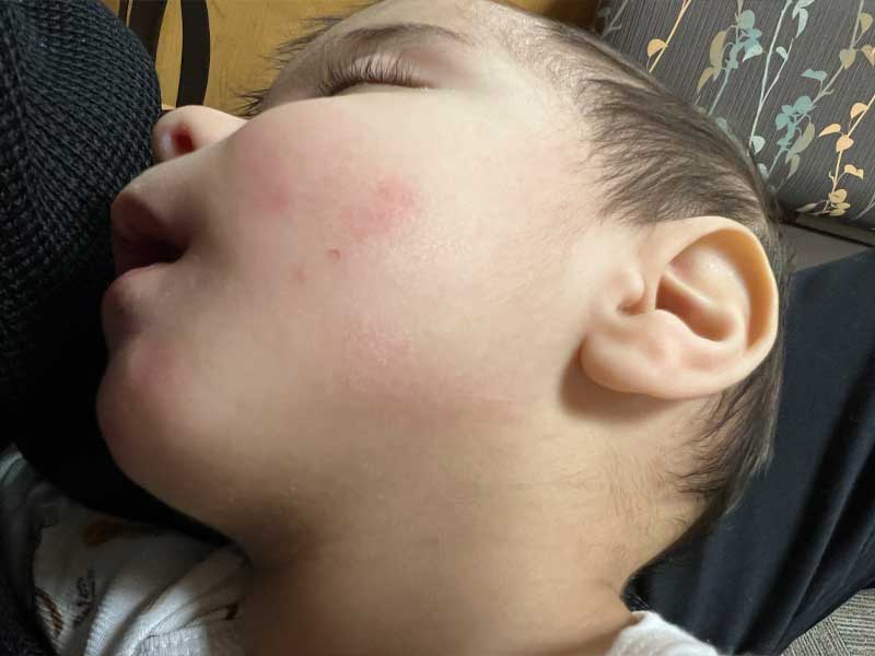 Photograph of Baby Cyrus unresponsive following time with St. Luke's Hospital