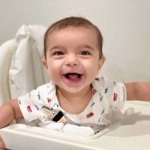 Photograph of Baby Cyrus in his gown