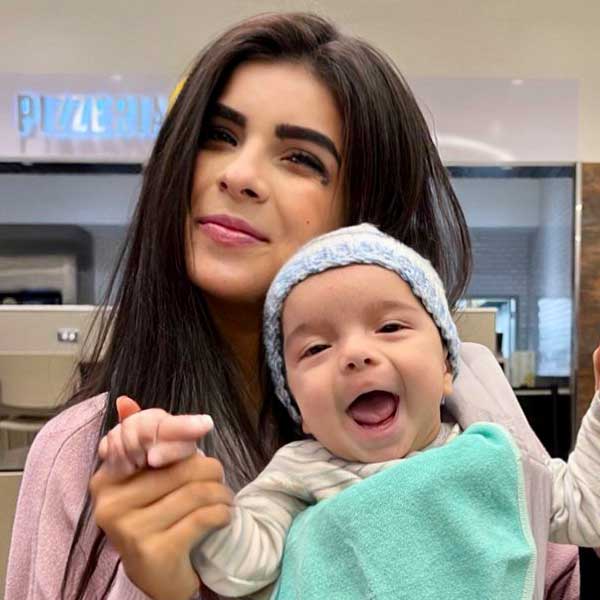 Photograph of Baby Cyrus and mom
