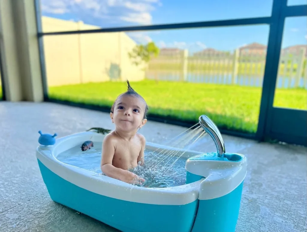 Baby Cyrus enjoying bath time