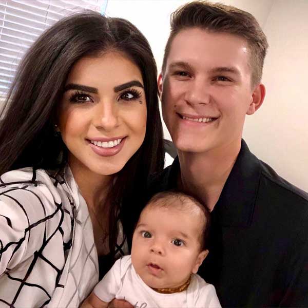 Photograph of Baby Cyrus and parents