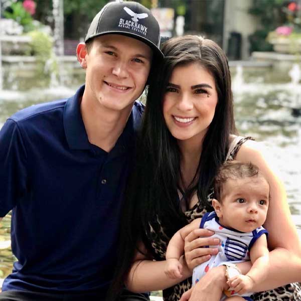 Photograph of Baby Cyrus and parents